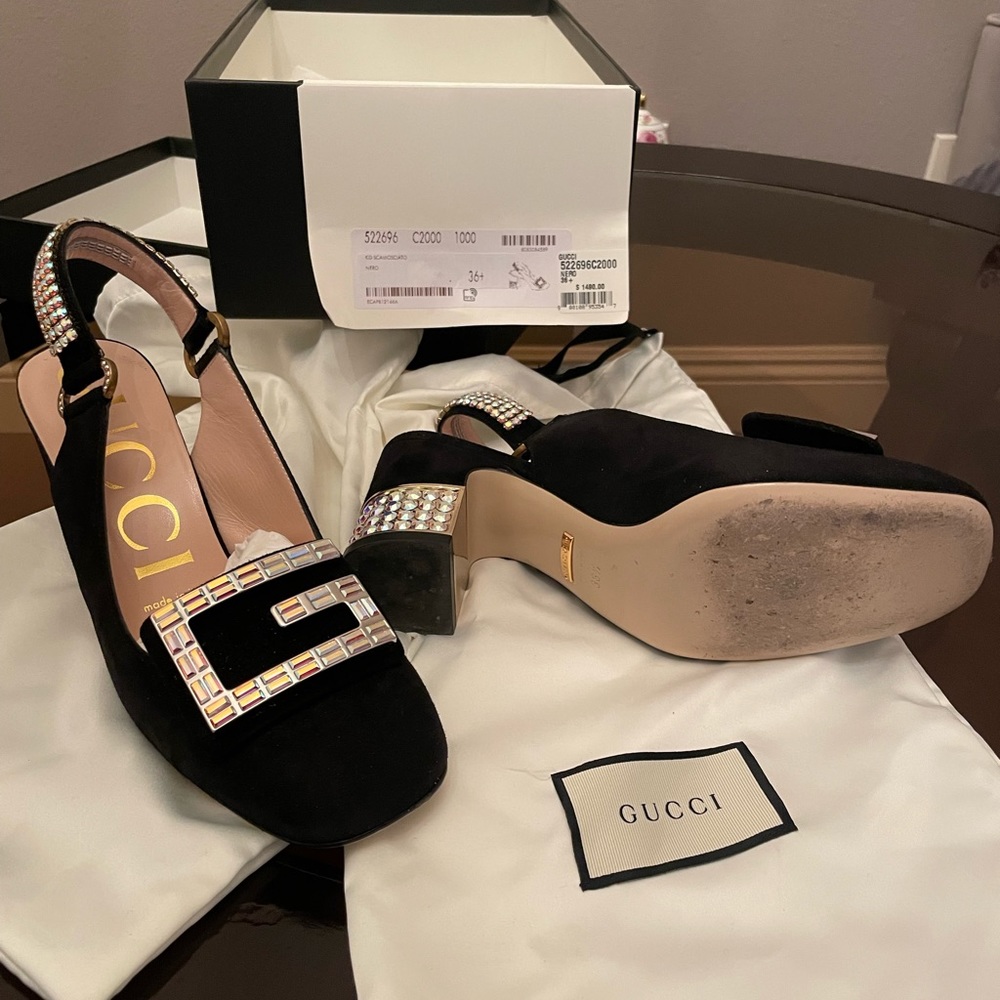 Gucci, black-kid scamociato